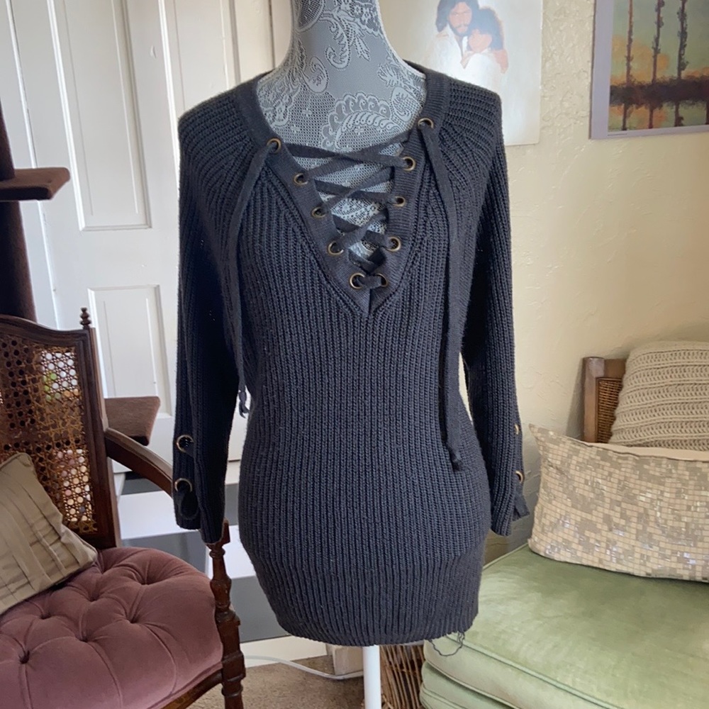 Oversized gray lace-up sweater.